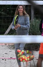 GISELE BUNDCHEN Playing Beach Tennis in Miami 01/17/2024