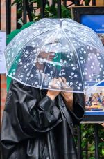 IRINA SHAYK Walking Under the Rain in Manhattan 01/26/2024