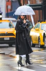 IRINA SHAYK Walking Under the Rain in Manhattan 01/26/2024