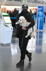 JAMIE LEE CURTIS and Her Service Dog Runi Arrives at JFK Airport in New York 01/15/2024