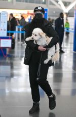 JAMIE LEE CURTIS and Her Service Dog Runi Arrives at JFK Airport in New York 01/15/2024