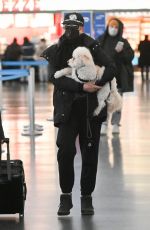 JAMIE LEE CURTIS and Her Service Dog Runi Arrives at JFK Airport in New York 01/15/2024