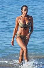 JENNY POWELL in Bikini at a Beach in Spain 01/03/2024