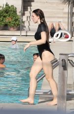 JULIA FOX in Swimsuit at a Pool in Miami 01/04/2024