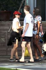JULIA FOX Spotted Poolside with Friends at a Hotel in Miami 01/03/2024