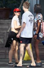 JULIA FOX Spotted Poolside with Friends at a Hotel in Miami 01/03/2024