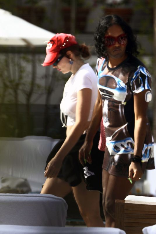 JULIA FOX Spotted Poolside with Friends at a Hotel in Miami 01/03/2024