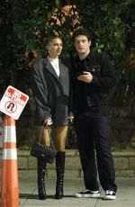 KATARINA DEME Squats on Sidewalk while Waiting for Her Car in Beverly Hills 01/19/2024