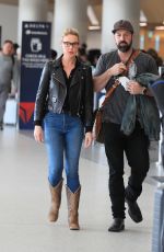 KATHERINE HEIGL and Josh Kelley at LAX in Los Angeles 01/17/2024