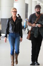 KATHERINE HEIGL and Josh Kelley at LAX in Los Angeles 01/17/2024