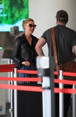 KATHERINE HEIGL and Josh Kelley at LAX in Los Angeles 01/17/2024