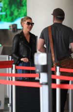 KATHERINE HEIGL and Josh Kelley at LAX in Los Angeles 01/17/2024