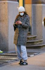 KATIE HOLMES in a Grey and Black Coat Out in New York 01/29/2024