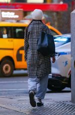 KATIE HOLMES in a Grey and Black Coat Out in New York 01/29/2024