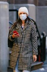 KATIE HOLMES in a Grey and Black Coat Out in New York 01/29/2024