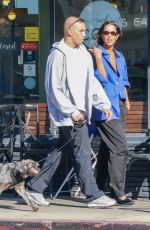 LAURA HARRIER and Sam Jarou Out with Their Dog in Los Angeles 01/30/2024
