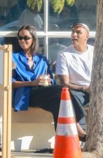 LAURA HARRIER and Sam Jarou Out with Their Dog in Los Angeles 01/30/2024