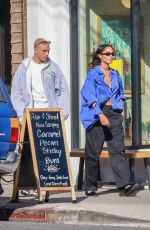 LAURA HARRIER and Sam Jarou Out with Their Dog in Los Angeles 01/30/2024