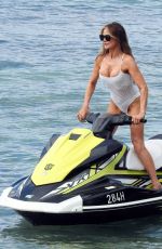 LIZZIE CUNDY in Swimsuit Jet Skiing in Barbados 01/01/2024