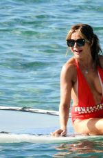 LIZZIE CUNDY in Swimsuit Paddleboarding in Barbados 12/31/2023
