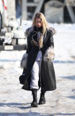 LOTTIE MOSS Out and About in Bucharest 01/26/2024