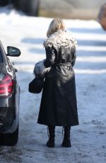 LOTTIE MOSS Out and About in Bucharest 01/26/2024