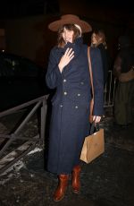 LOU DOILLON Arrives at AMI - Alexandre Mattiussi Menswear Fall/Winter 2024-2025 Show at Paris Fashion Week 01/18/2024