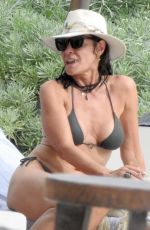LUANN DE LESSEPS in Bikini at a Beach in Tulum 01/11/2024