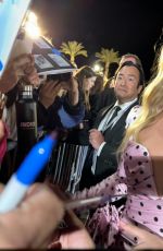 MARGOT ROBBIE Signs Autographs for Fans at Palm Springs International Film Festival 01/04/2024