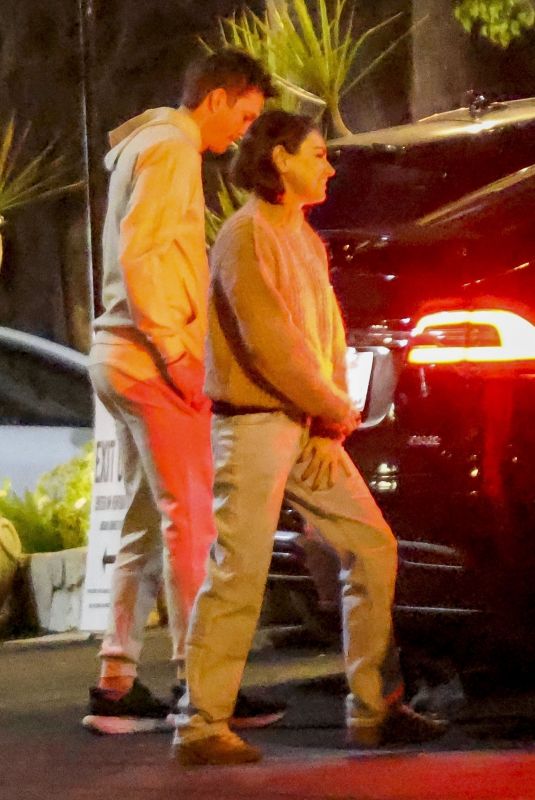 MILA KUNIS and Ashton Kutcher Arrives at PINZ Entertainment Center Bowling in Studio City 12/31/2023