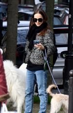 NATALIE PORTMAN Out with Her Dogs on Champ-de-Mars Gardens in Paris 01/27/2024