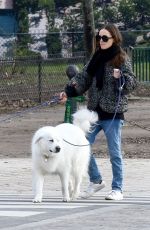 NATALIE PORTMAN Out with Her Dogs on Champ-de-Mars Gardens in Paris 01/27/2024