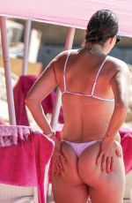 RHEA DURHAM in a White Bikini on New Year