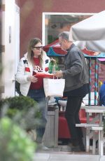 RITA WILSON and Tom Hanks Shopping and Having Lunch at Brentwood Country Mart 01/15/2024