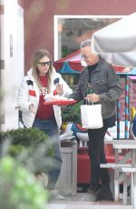RITA WILSON and Tom Hanks Shopping and Having Lunch at Brentwood Country Mart 01/15/2024