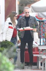 RITA WILSON and Tom Hanks Shopping and Having Lunch at Brentwood Country Mart 01/15/2024