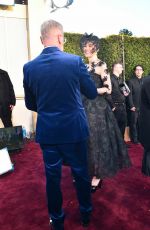 ROSAMUND PIKE Arrives at Golden Globe Awards in Los Angeles 01/07/2024