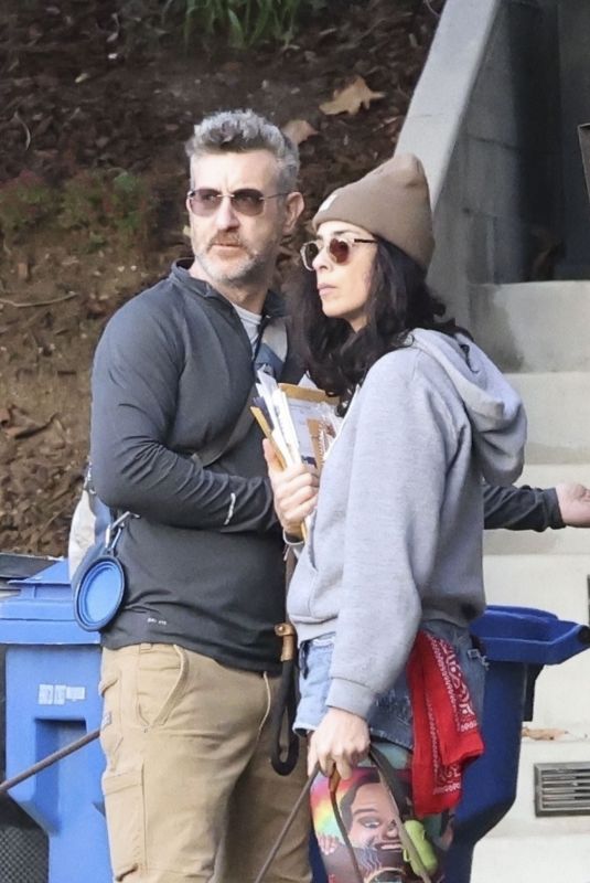 SARAH SILVERMAN and Rory Albanese Collected Her Mail and Walk with Their Dogs in Los Feliz 01/02/2024