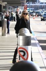 SHERYL VROW Arrives in Los Angeles 01/27/2024