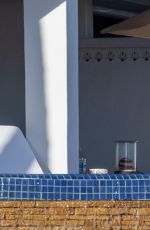 SIBI BLAZIC and Christian Bale at a Pool in Los Cabos 01/29/2024