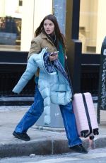 SURI CRUISE Out Carrying a Pink Luggage in New York 01/18/2024