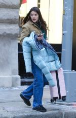 SURI CRUISE Out Carrying a Pink Luggage in New York 01/18/2024