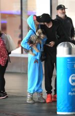 TARA REID and Nathan Montpetit-Howar at LAX in Los Angeles 01/19/2024