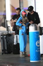 TARA REID and Nathan Montpetit-Howar at LAX in Los Angeles 01/19/2024