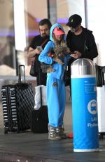 TARA REID and Nathan Montpetit-Howar at LAX in Los Angeles 01/19/2024