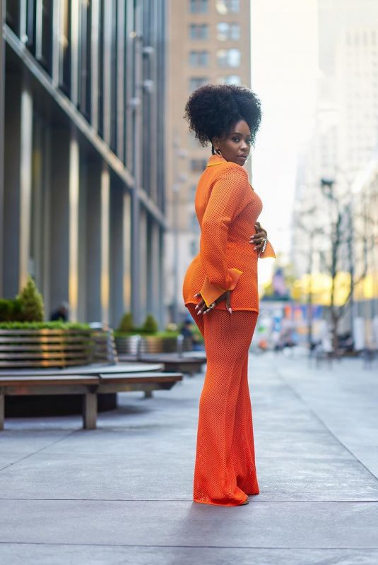 TEYONAH PARRISH at a Photoshoot, December 2023