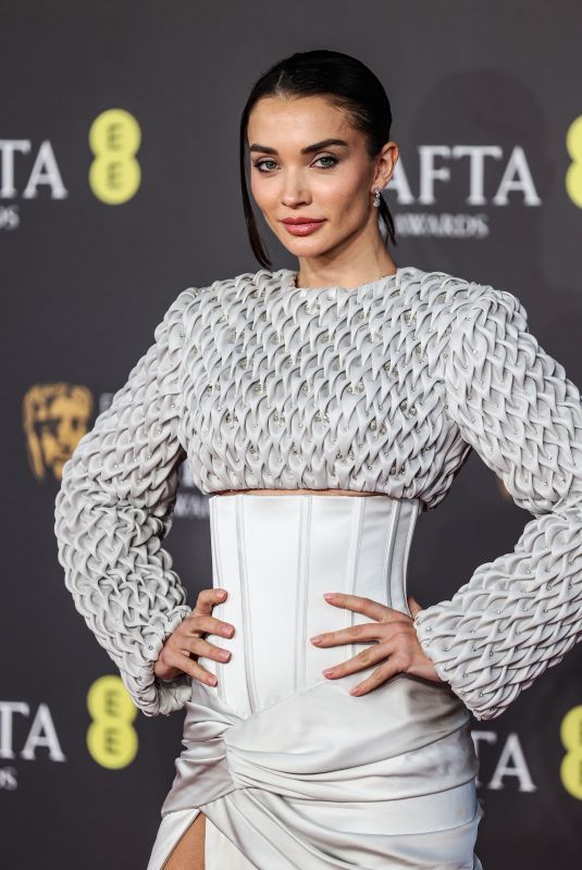 AMY JACKSON at EE Bafta Film Awards 2024 in London 02/18/2024