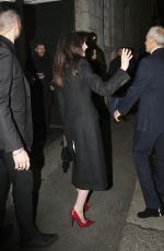 ANNE HATHAWAY Leaves Versace Fashion Show Milan 02/23/2024