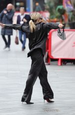 ASHLEY ROBERTS Records a Tick Tok Video at Heart Breakfast in London 02/28/2024