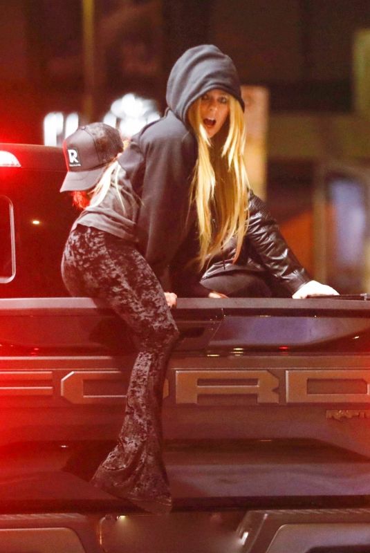 AVRIL LAVIGNE and Nate Smith Drink in Back of Their Truck and Skateboard Around West Hollywood 01/30/2024